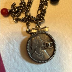 Chanel 2004 charm bracelet featuring Coco Chanel.